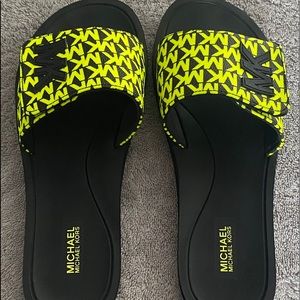 Michael Kros slides black and neon green